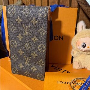 Louis Vuitton Monogram vertical bifold wallet